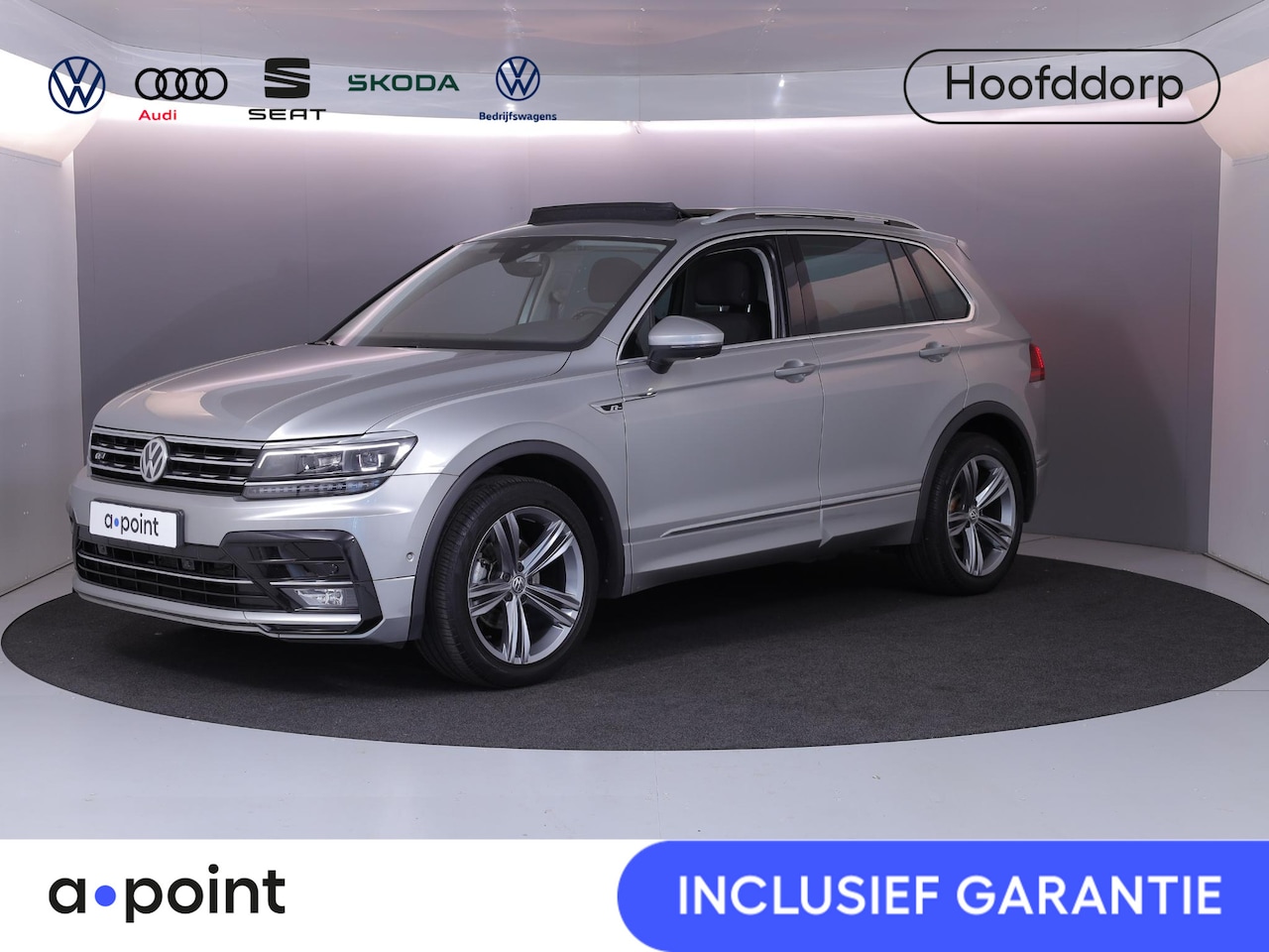 Volkswagen Tiguan - 1.4 TSI 4Motion Highline 150pk AUT| Pano.dak | 19'LM-velgen| Navi | verwarmde voorruit| Al - AutoWereld.nl