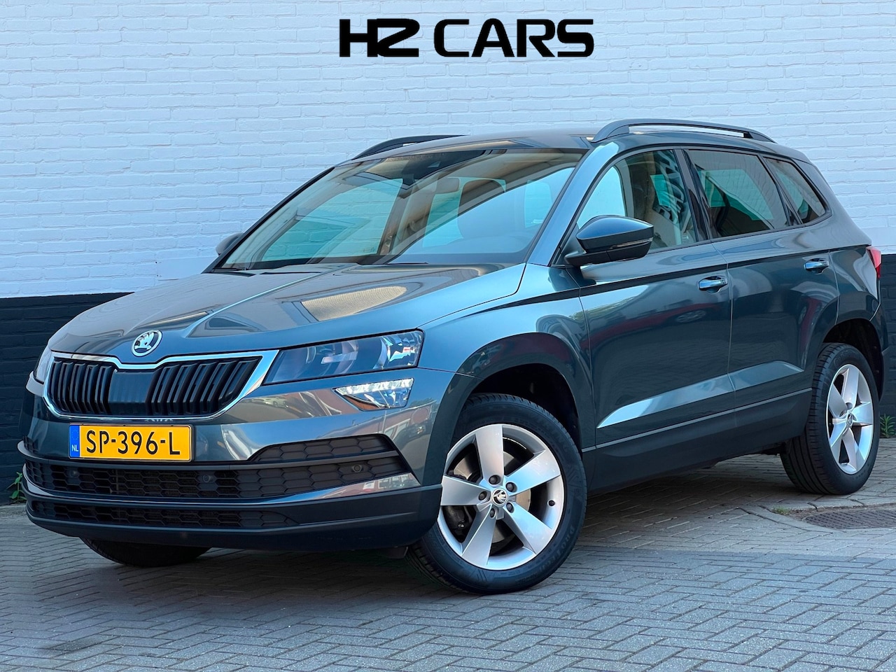 Skoda Karoq - 1.5 TSI ACT Ambition Business|Trekhaak|Adaptive|ParkPilot|Carplay|17 inch - AutoWereld.nl