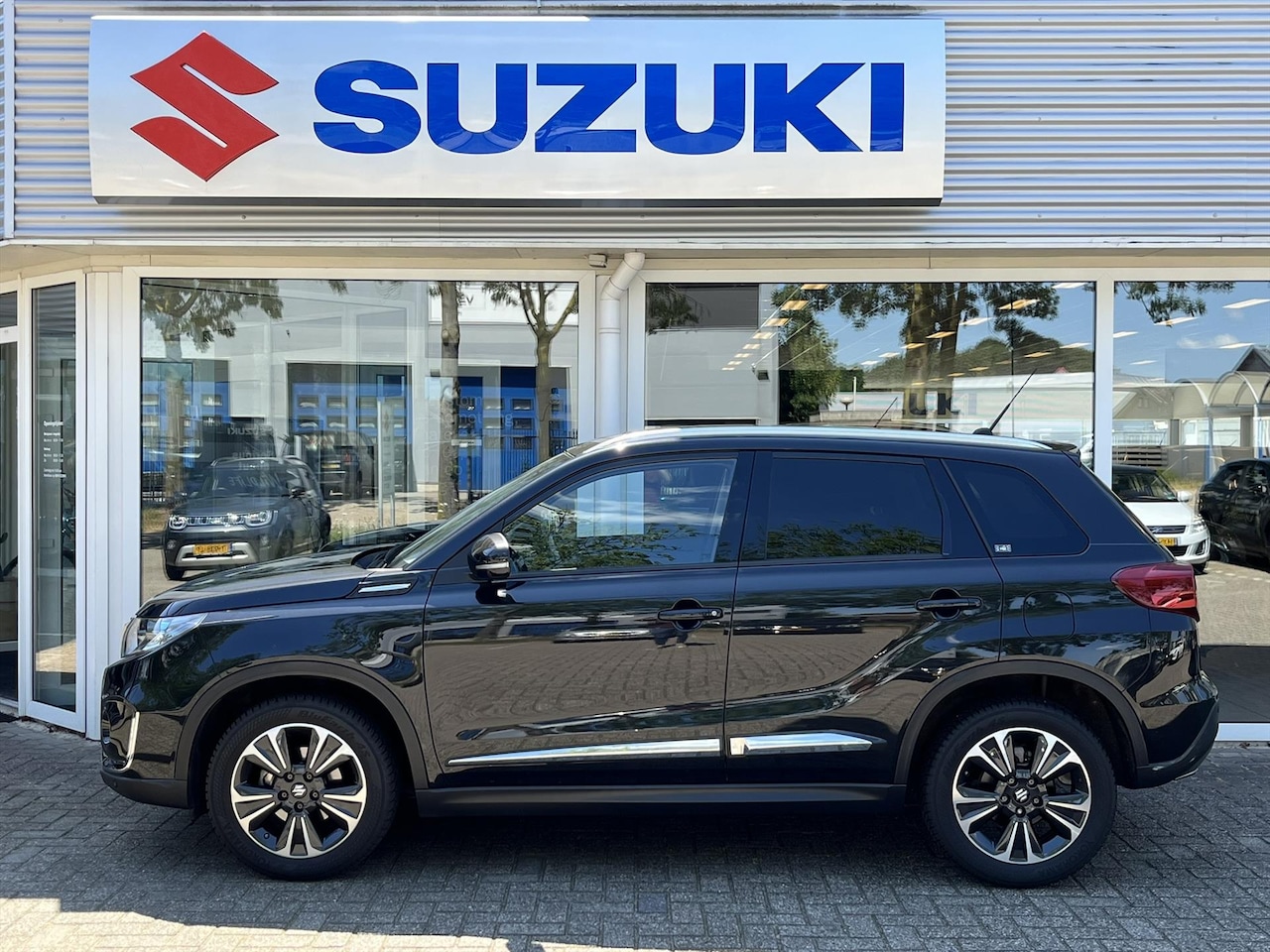 Suzuki Vitara - 1.4 Boosterjet 140pk Stijl Panoramadak (RIJKLAARPRIJS) Tot 10 jaar Suzuki Garantie* - AutoWereld.nl