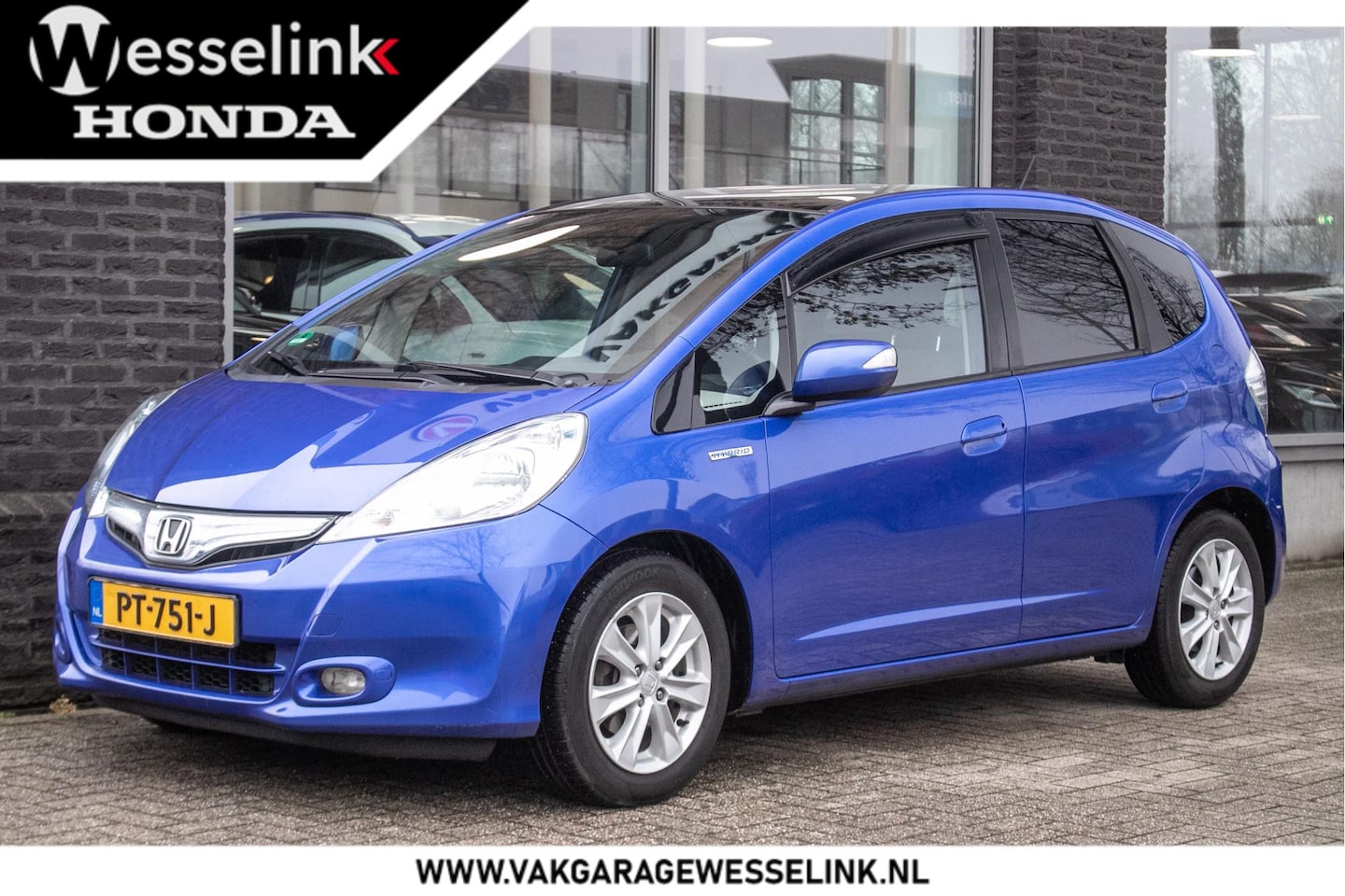 Honda Jazz - 1.4 Hybrid Elegance | Panoramadak | Climate | Cruise | - AutoWereld.nl