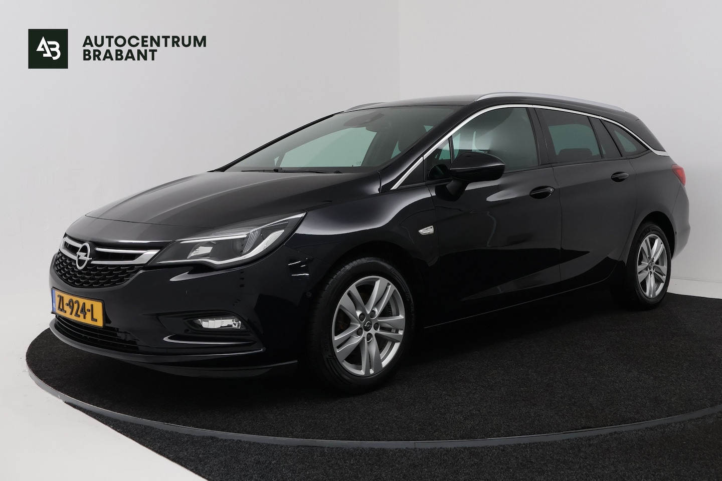 Opel Astra Sports Tourer - 1.0 Turbo Business Executive (TREKHAAK, CAMERA, STOEL/STUUR VERWARMING, NAVIGATIE, PARKEER - AutoWereld.nl