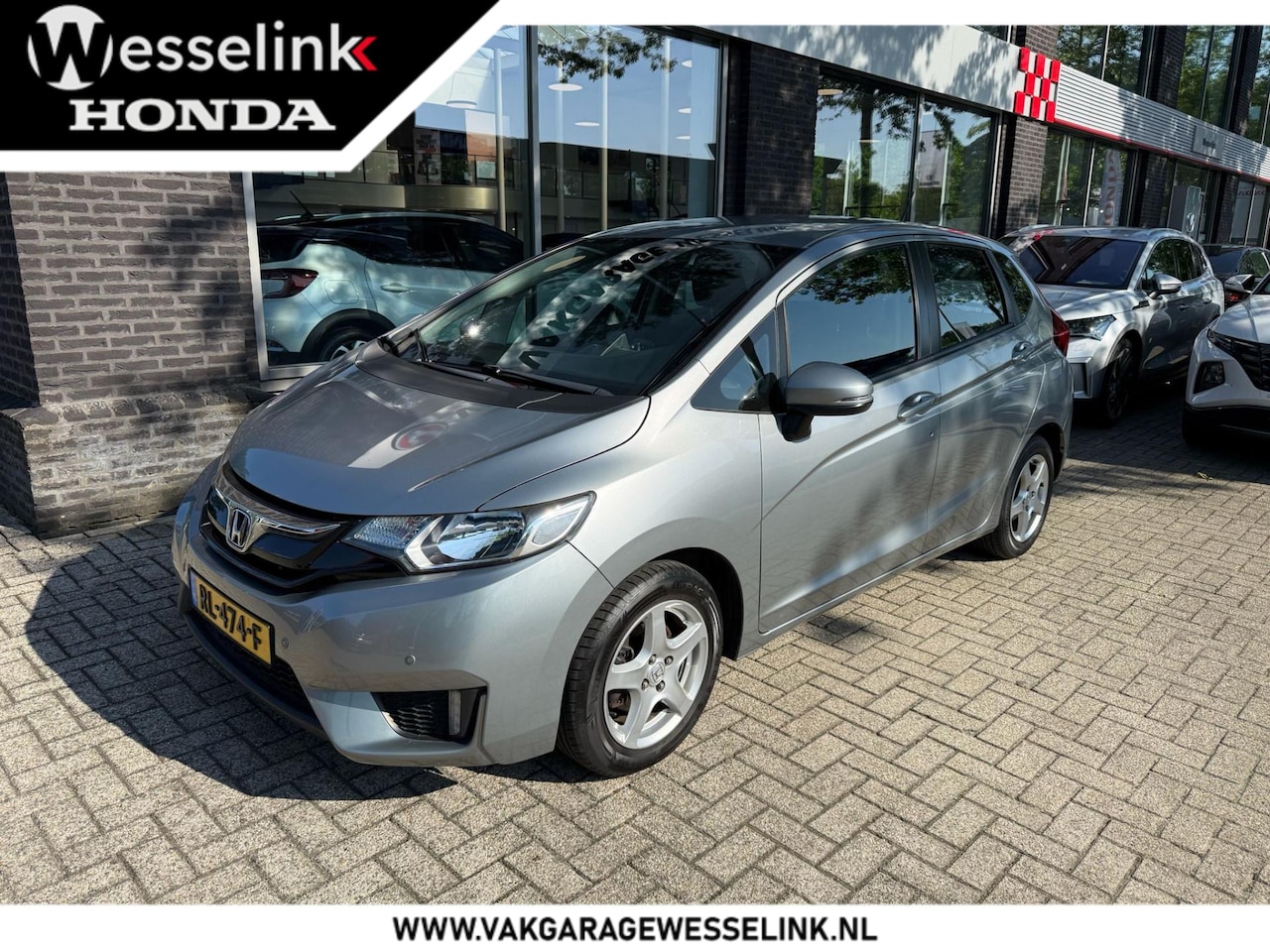 Honda Jazz - 1.3 i-VTEC Trend | Navigatie | Parkeersensoren | Stoelverw. - AutoWereld.nl