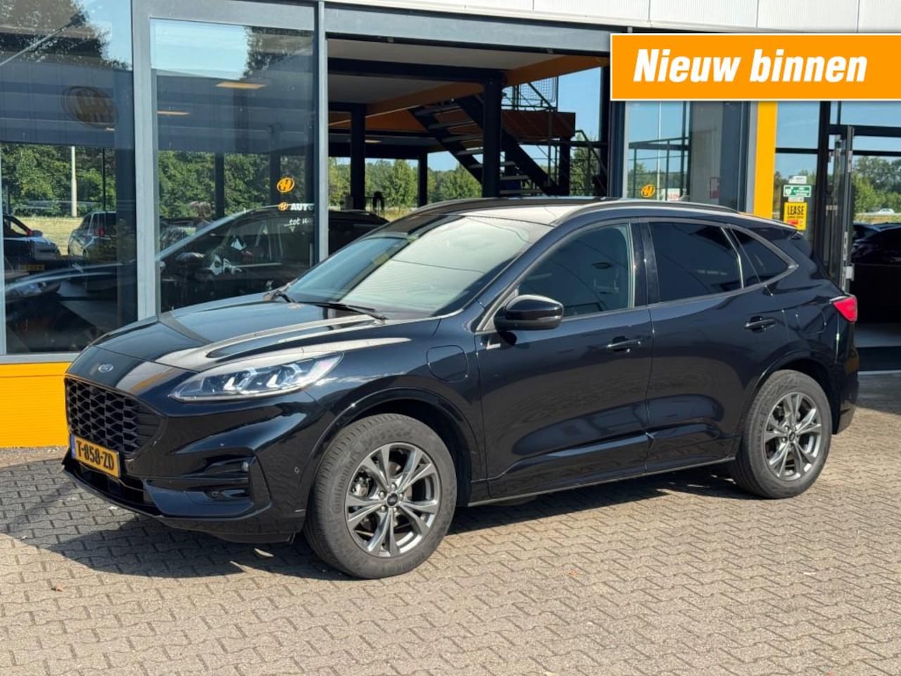 Ford Kuga - 2.5 PHEV ST-Line - camera - stoel/stuur verwarming - head up - adap cruise - AutoWereld.nl