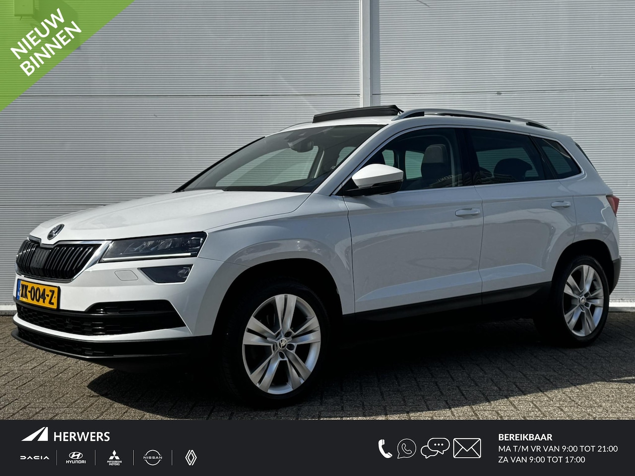 Skoda Karoq - 1.5 TSI ACT Style Business / Navigatie + Apple Carplay/Android Auto / Elek. Schuif-/Kantel - AutoWereld.nl