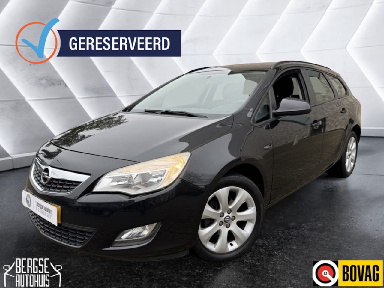 Opel Astra Sports Tourer - 1.4 Turbo Bns + Airco Cruise Navi - AutoWereld.nl