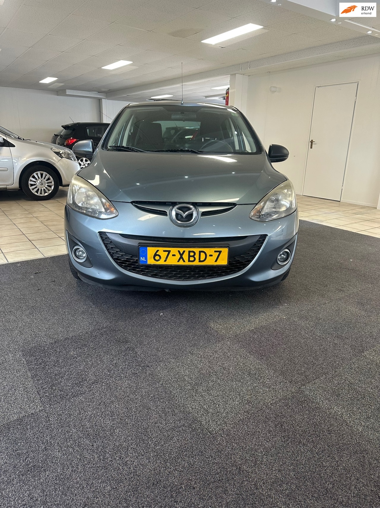 Mazda 2 - 1.3 BIFUEL Navigator GT.1de eigenaar.Airco - AutoWereld.nl