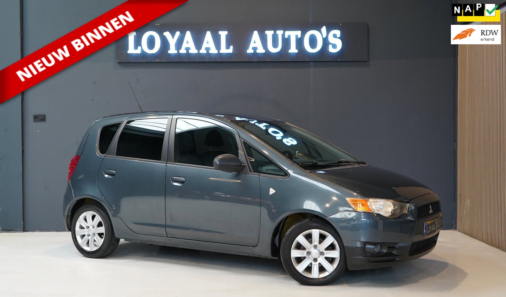 Mitsubishi Colt - 1.3 Edition Two | AIRCO | PDC | NAVI | NAP | APK - AutoWereld.nl