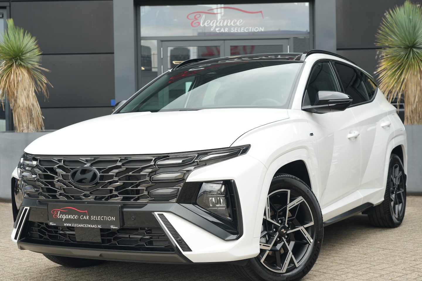 Hyundai Tucson - 1.6 T-GDI PHEV N Line 4WD 265pk Panoramadak/Navigatie/Camera - AutoWereld.nl