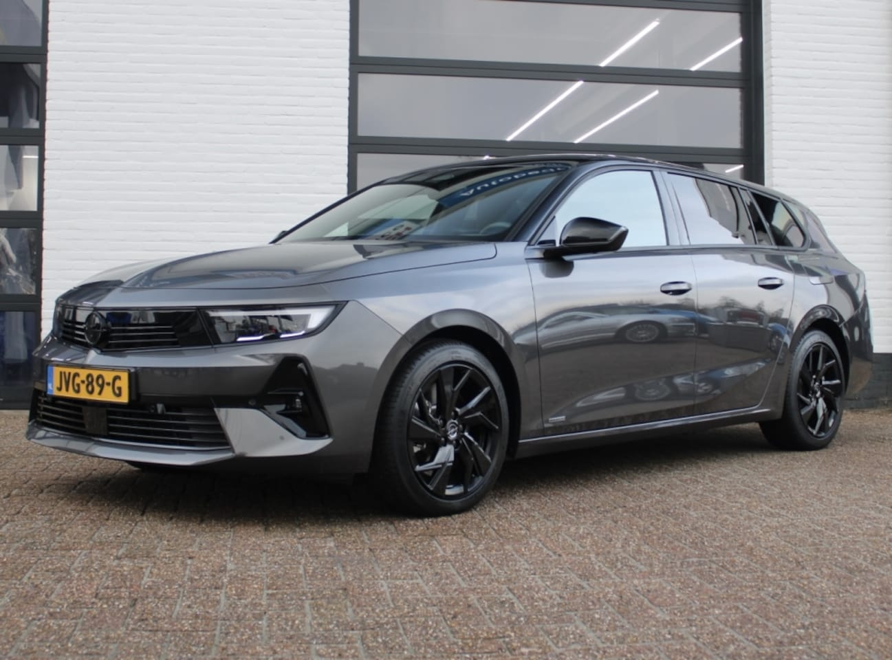 Opel Astra Sports Tourer - 1.6 Hybrid 180pk Aut GS - AutoWereld.nl