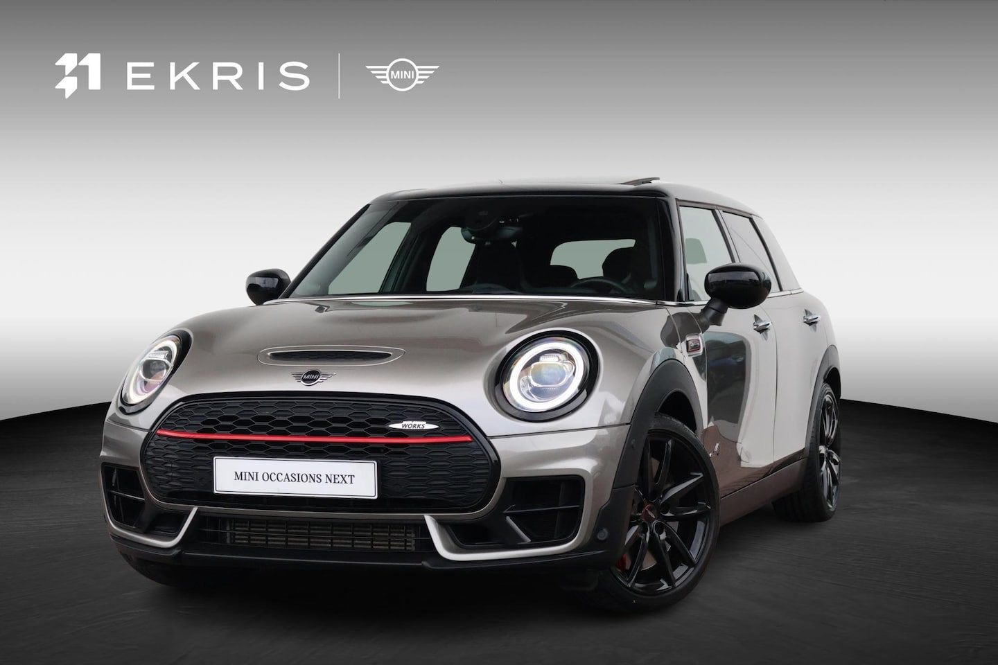 MINI Clubman - 2.0 JCW ALL4 Chili | Pano dak | Head-up | Harman Kardon | Verwarmbare voorstoelen | Achter - AutoWereld.nl