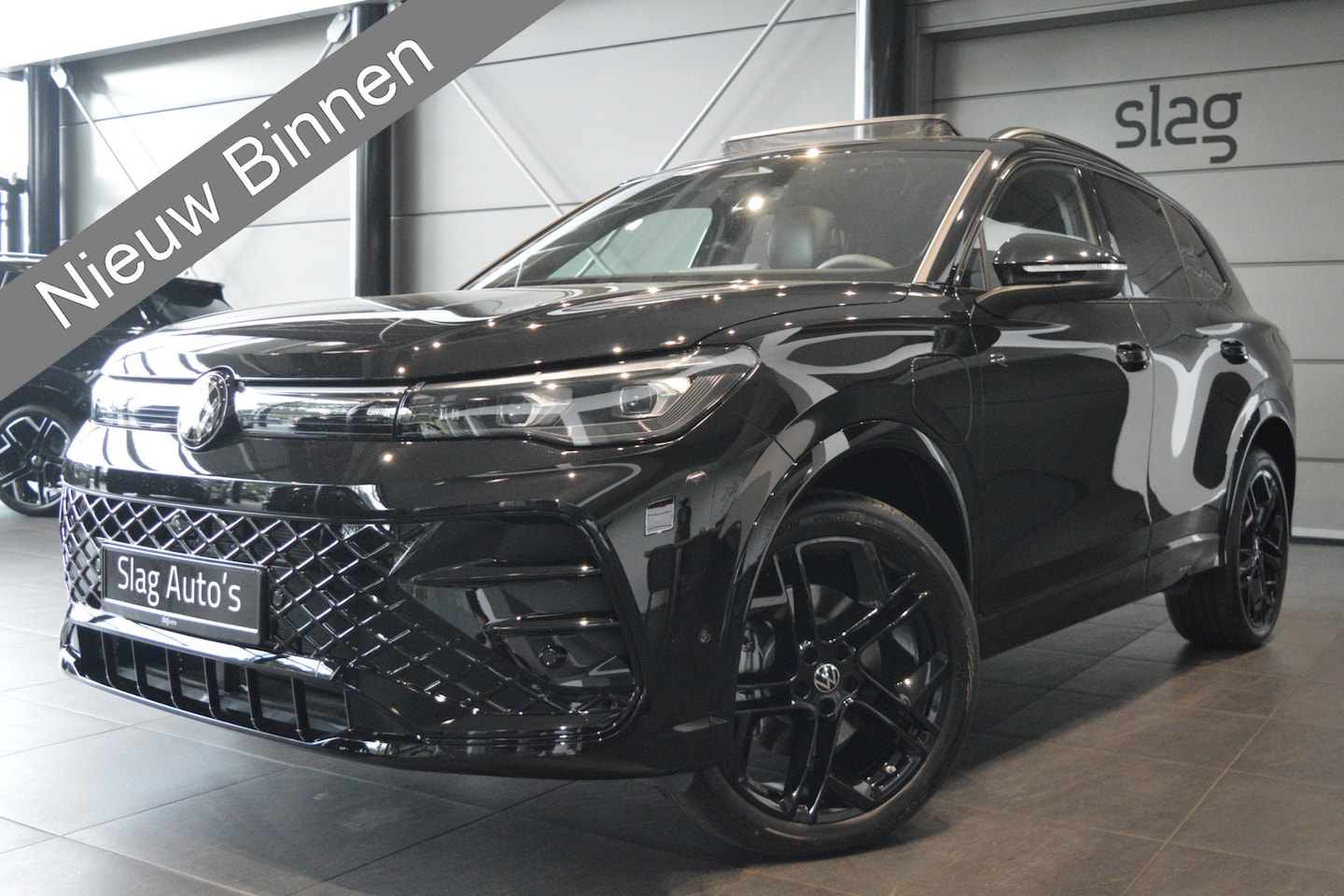 Volkswagen Tiguan - 1.5 eHybrid 3X R-LINE leer pano head up trekhaak 272 pk !! - AutoWereld.nl