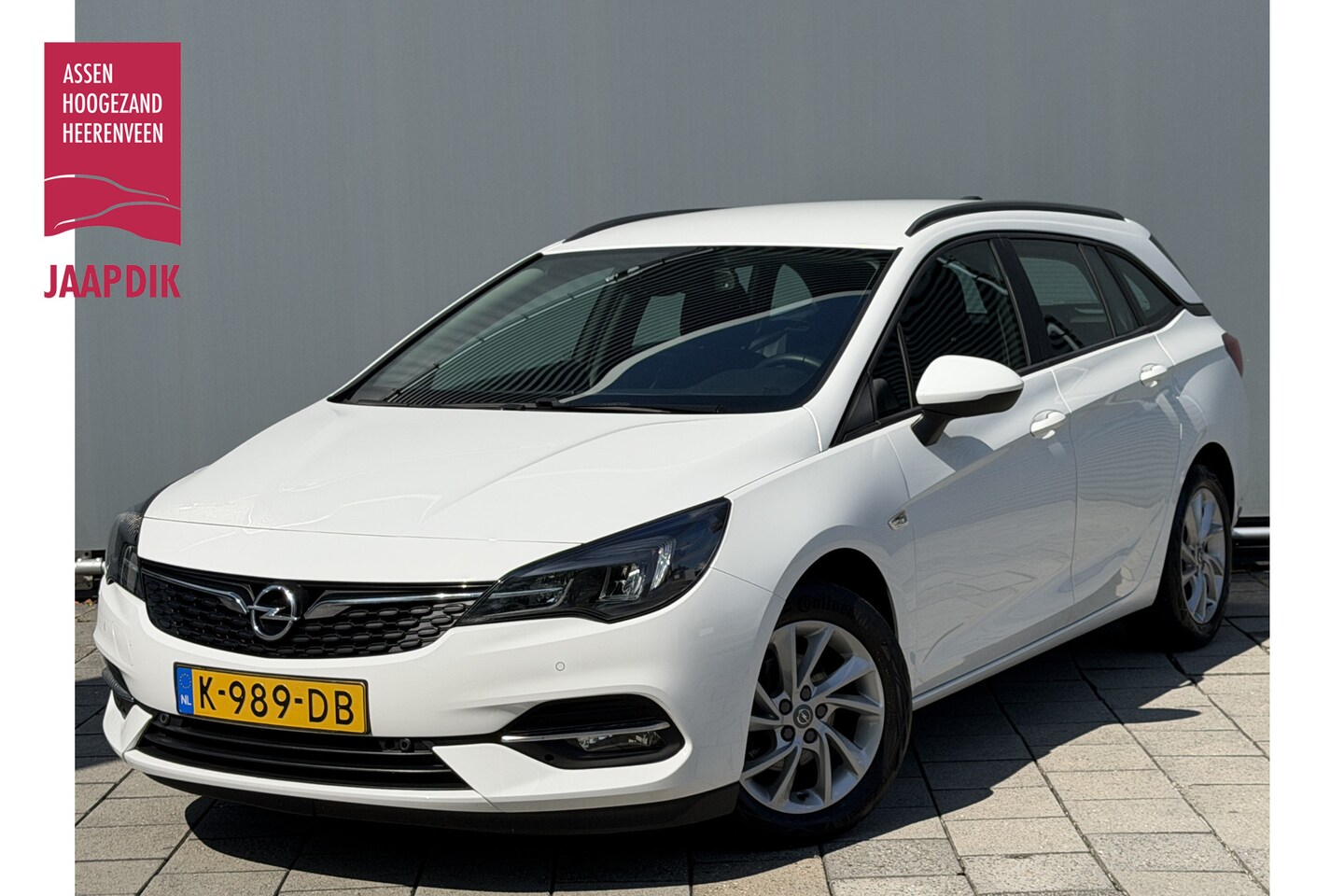 Opel Astra Sports Tourer - BWJ 2020 | 1.2T 111PK EXECUTIVE TREKHAAK | CLIMA | NAVI | CARPLAY | SPORTSTOELEN | PDC 2X - AutoWereld.nl