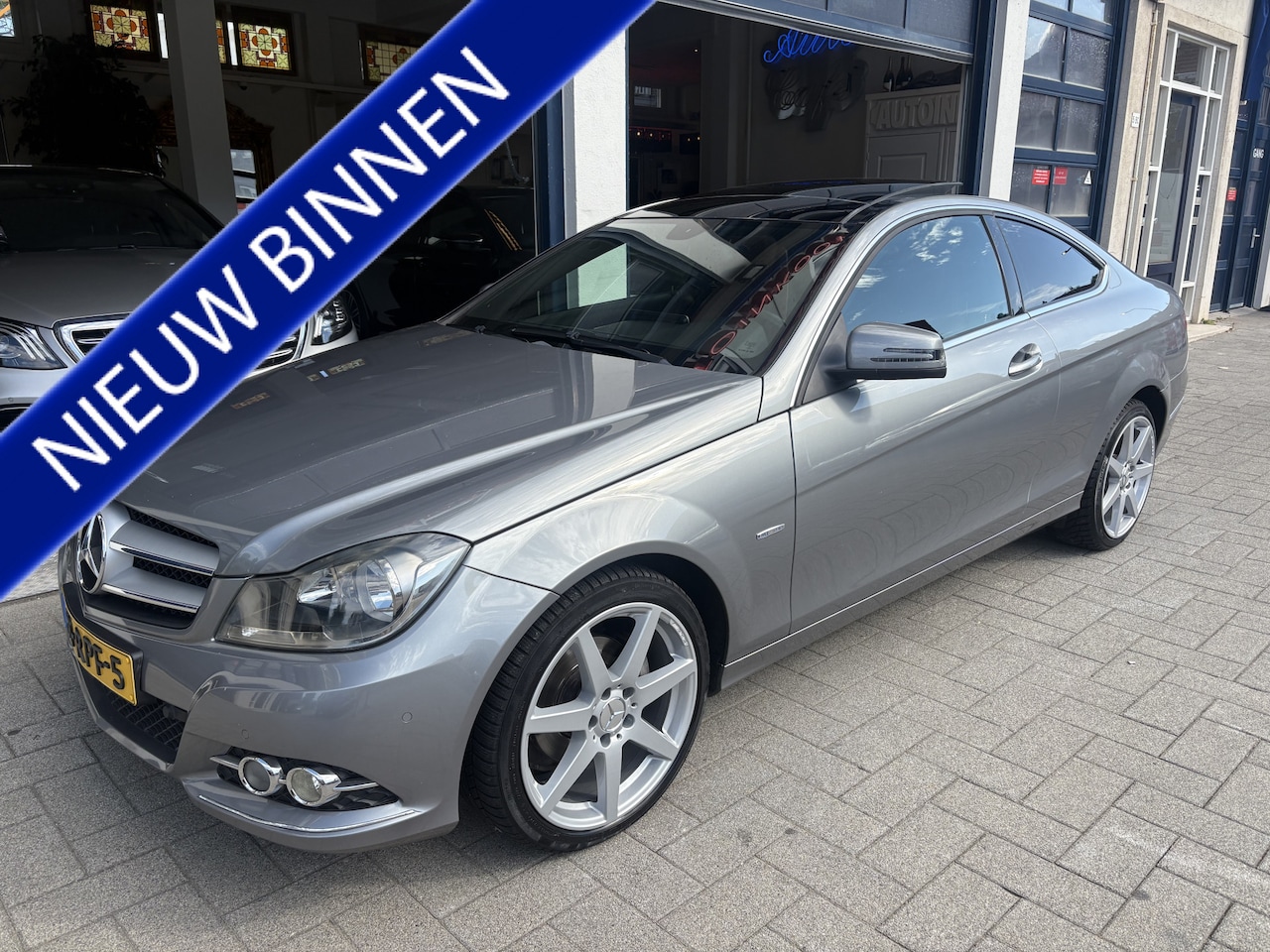 Mercedes-Benz C-klasse Coupé - 180 NL AUTO/PANORAMA/LEDER - AutoWereld.nl