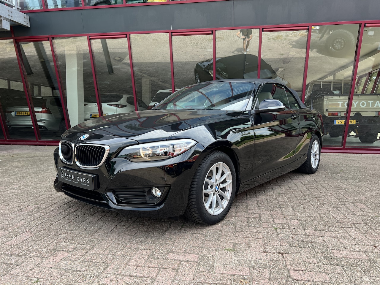 BMW 2-serie Cabrio - 220i | NL auto | 2e eigenaar | PDC | Navi | Leder | Stoelverw. - AutoWereld.nl