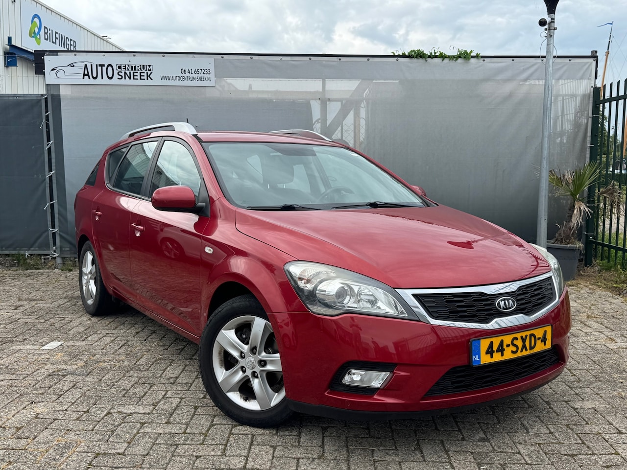 Kia Cee'd Sporty Wagon - 1.4 CVVT - Clima - Cruise - NAVI - APK 07-27 - AutoWereld.nl