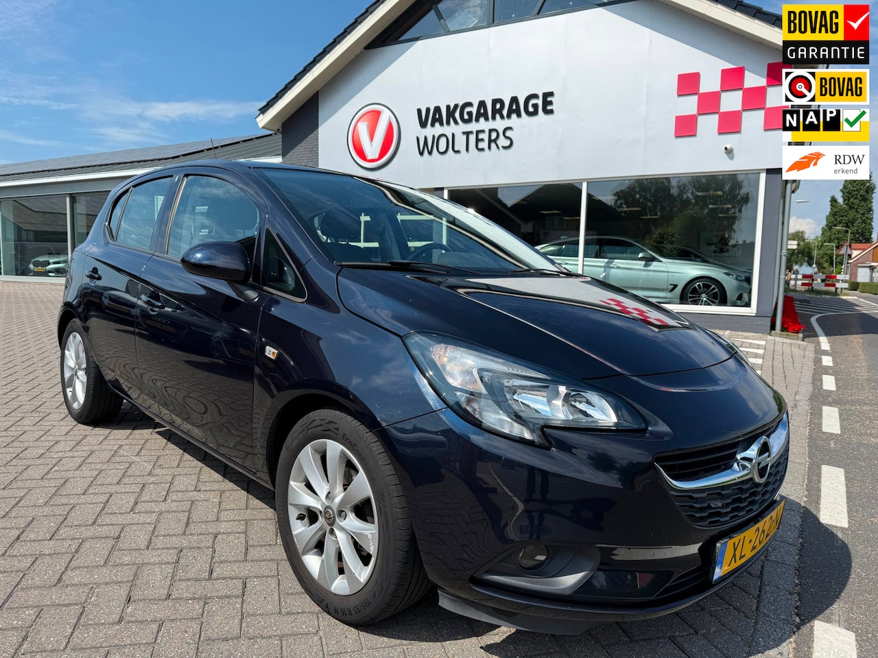 Opel Corsa - 1.4 Favourite RIJKLAARPRIJS! - AutoWereld.nl