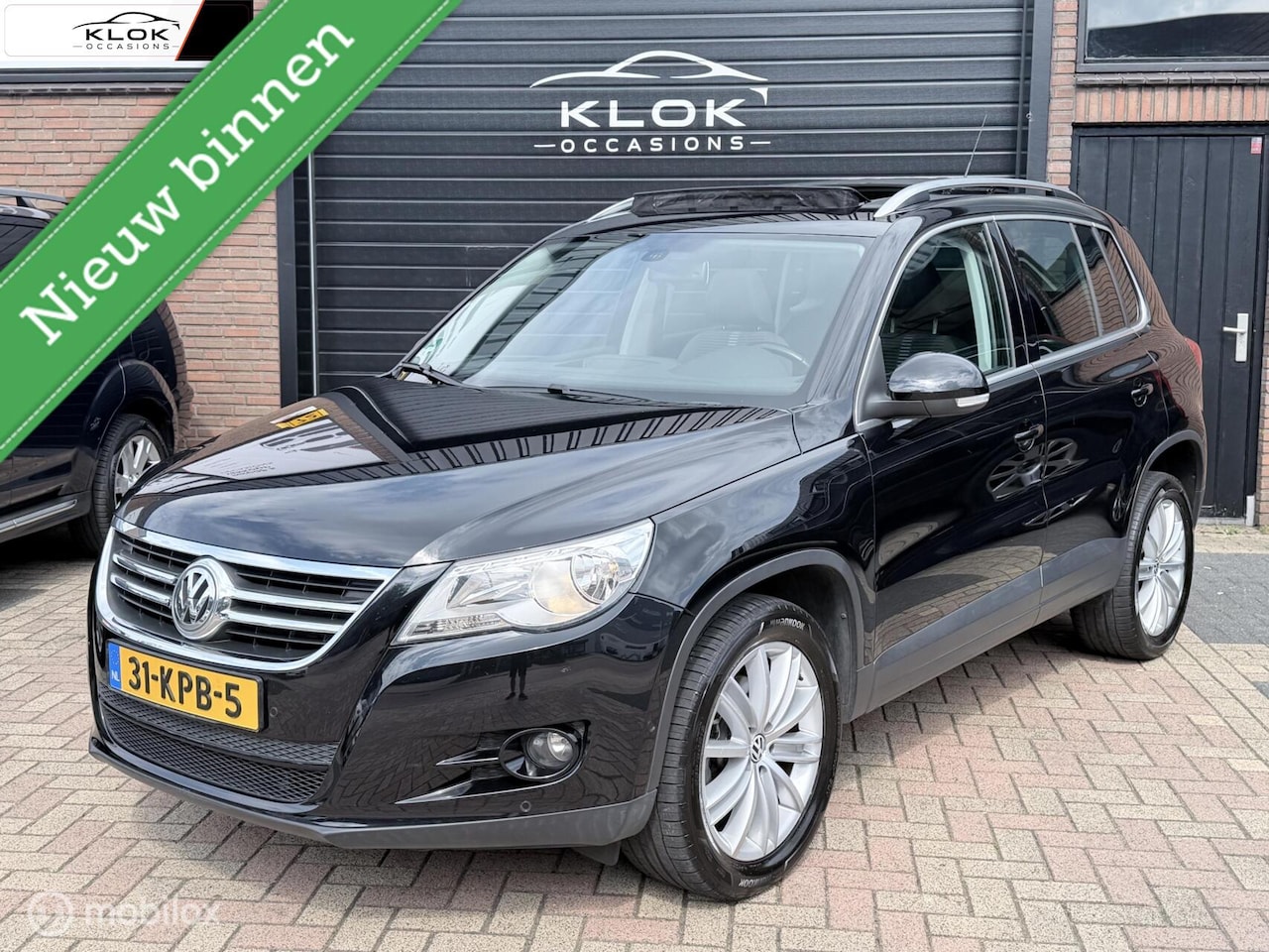 Volkswagen Tiguan - 1.4 TSI Sport&Style Cruise Pano NAP Trekha - AutoWereld.nl