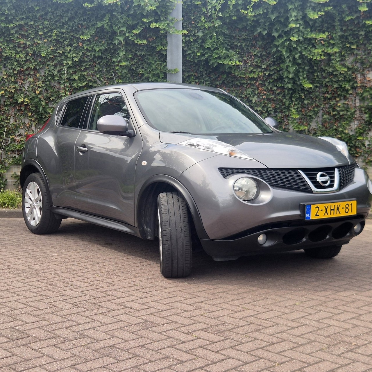 Nissan Juke - 1.6 Tekna | Navi | Camera | Keyless | Cruise | Climate - AutoWereld.nl