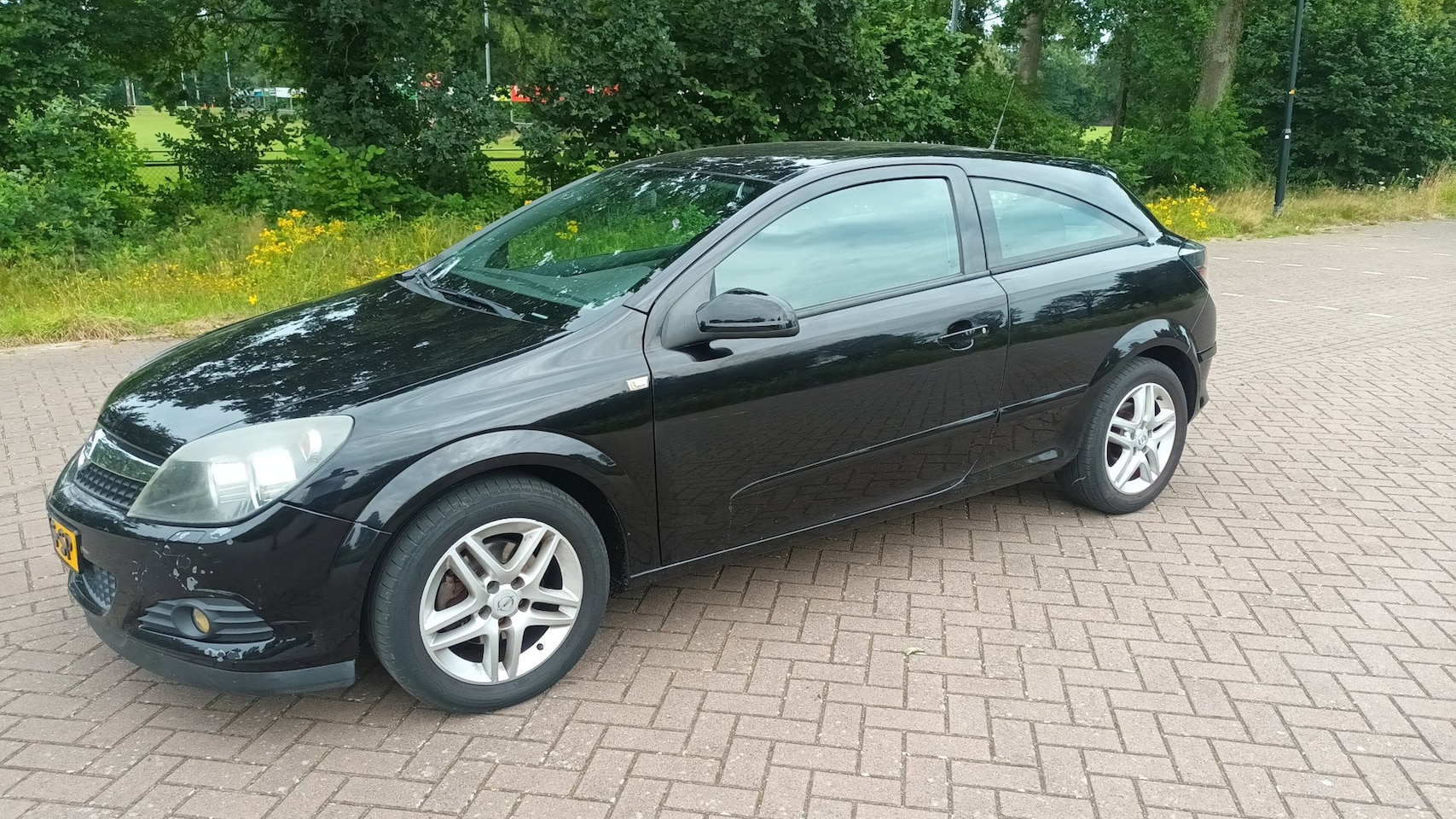 Opel Astra GTC - 1.6 Airco / apk 05-27 - AutoWereld.nl