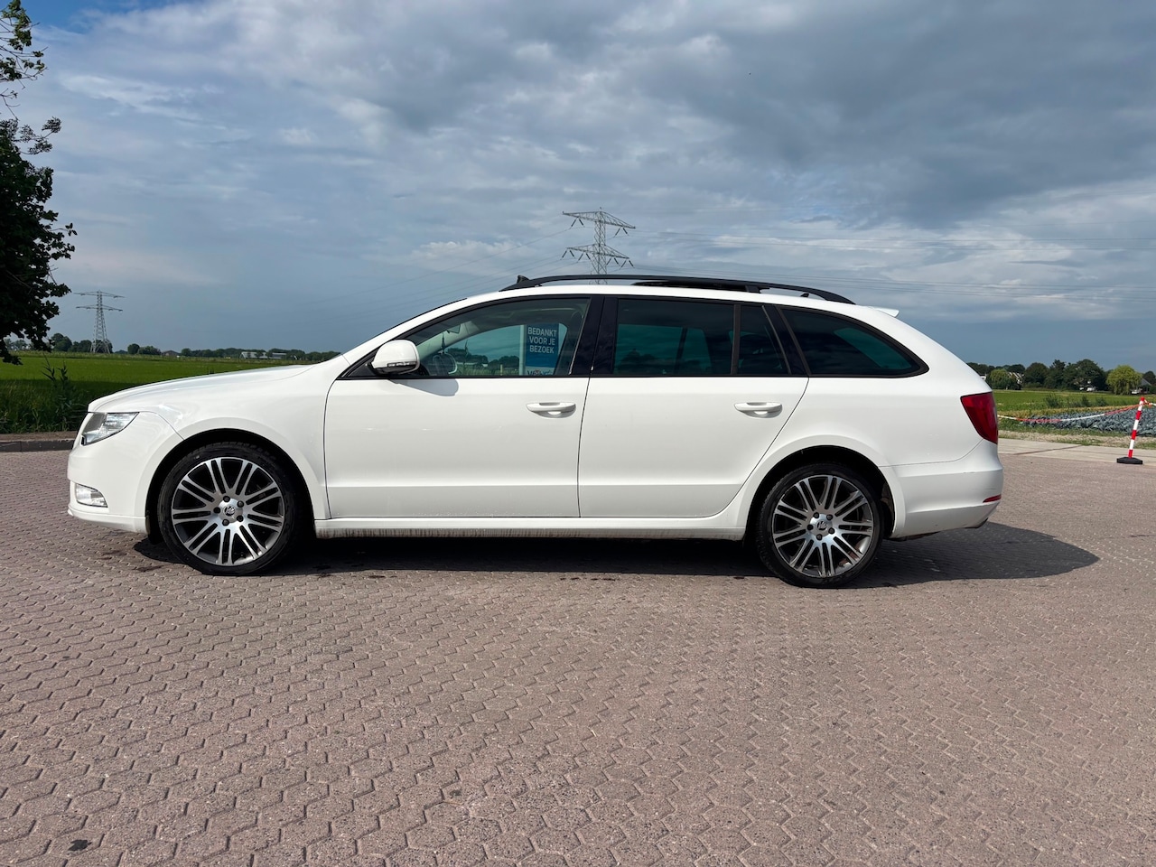 Skoda Superb Combi - 1.8 TSI Comfort PANO LEDER - AutoWereld.nl