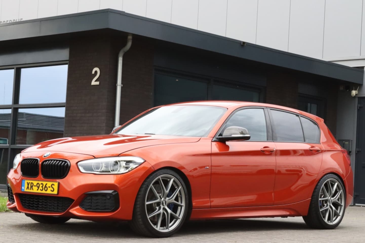 BMW 1-serie - M140i xDrive I KW V3 I Mosselman 450PK I Leder - AutoWereld.nl