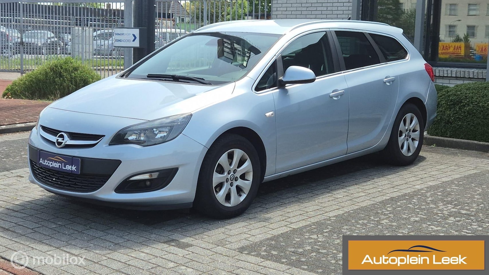Opel Astra Sports Tourer - 1.4 Turbo Edition trekhaak clima - AutoWereld.nl