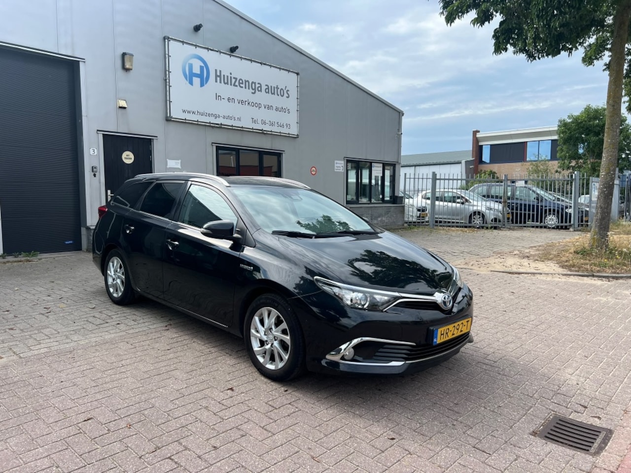 Toyota Auris Touring Sports - 1.8 Hybr. Executive| Met APK! - AutoWereld.nl