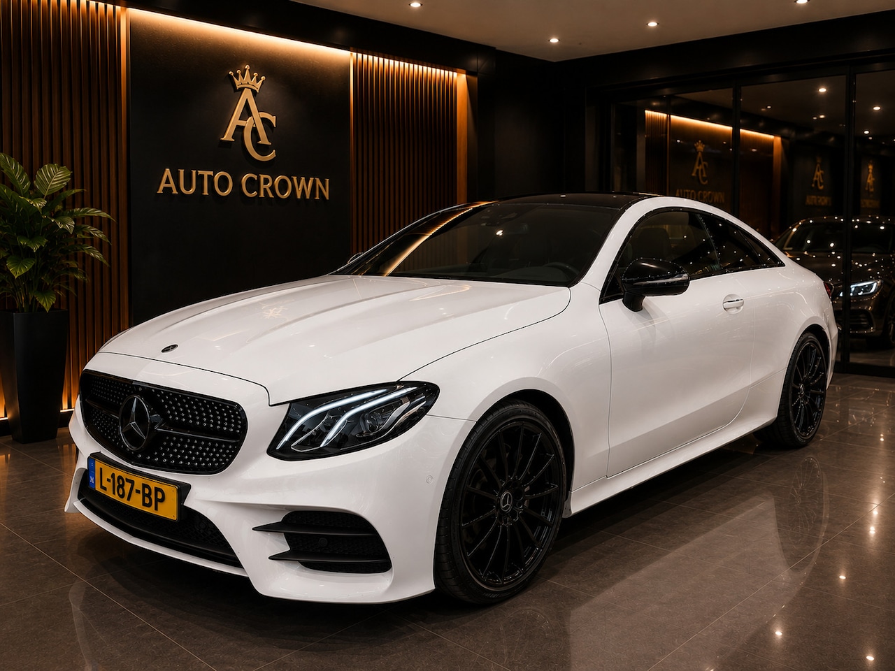 Mercedes-Benz E-klasse Coupé - 200 AMG-pakket parelmoer wit - AutoWereld.nl
