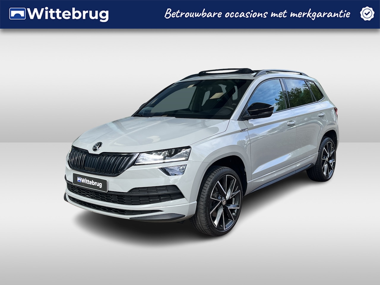 Skoda Karoq - 1.5 TSI ACT Sportline Business / Panorama dak / Carplay / Stoelverwarming voor en achter / - AutoWereld.nl