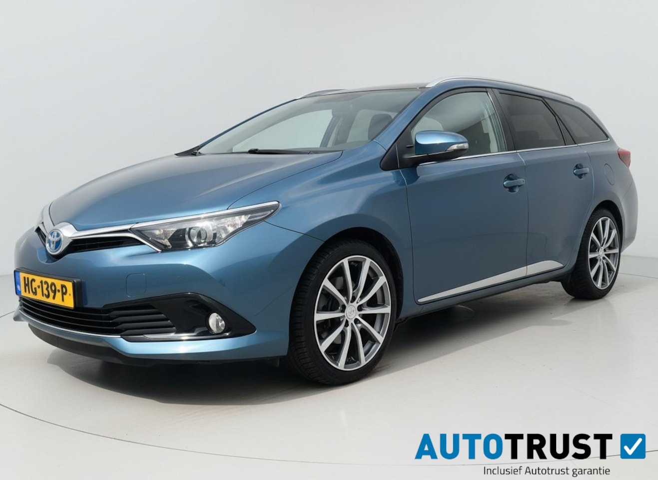 Toyota Auris Touring Sports - 1.8 Hybrid Lease AUTOMAAT PANO CRUISE NAV - AutoWereld.nl