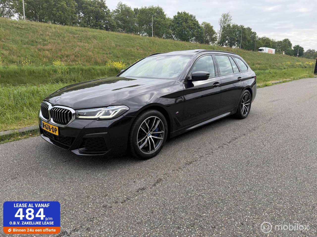 BMW 5-serie Touring - 530d High Executive panoramadak - AutoWereld.nl