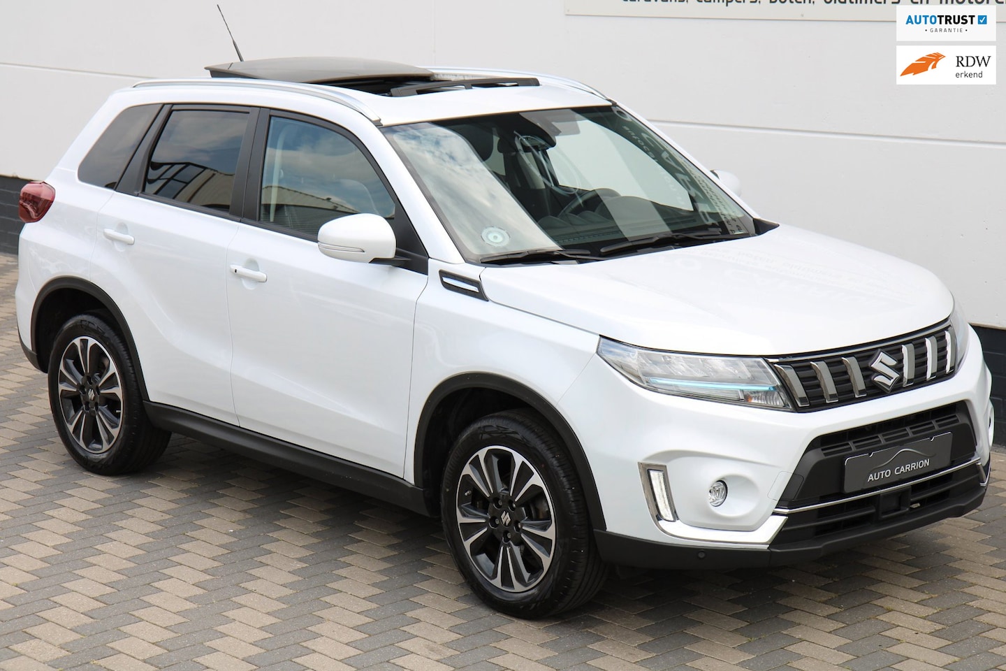 Suzuki Vitara - 1.5 Hybrid Adventure Pano Carplay Camera ACC ! - AutoWereld.nl