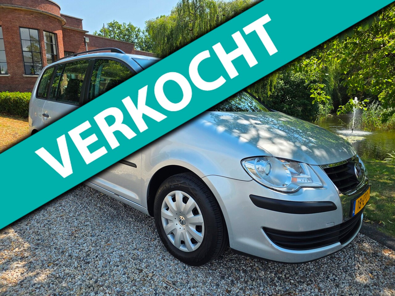 Volkswagen Touran - 1.6 Trendline 7-PERSOONS airco/CRUISE - AutoWereld.nl