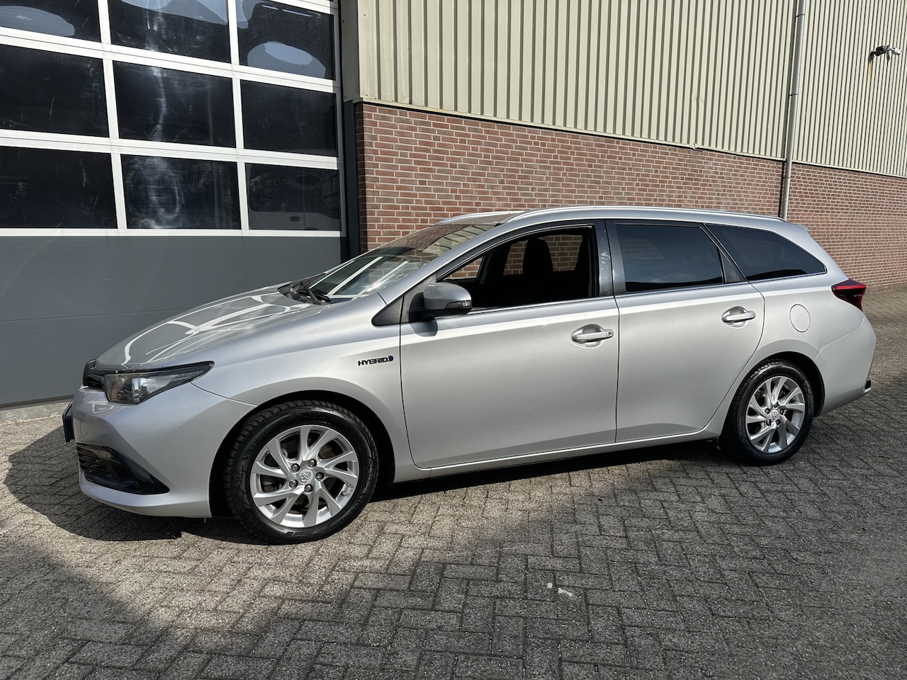 Toyota Auris Touring Sports - 1.8 Hybrid Energy Plus Airco,Camera,Trek,Enz - AutoWereld.nl