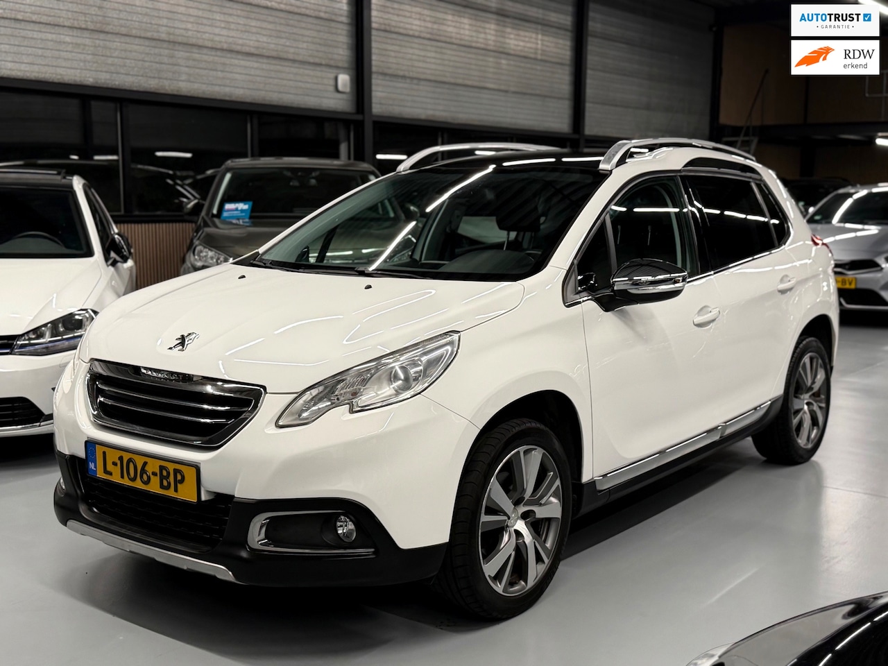 Peugeot 2008 - 1.6 VTi Féline Pano l Leder l Xenon l Full - AutoWereld.nl