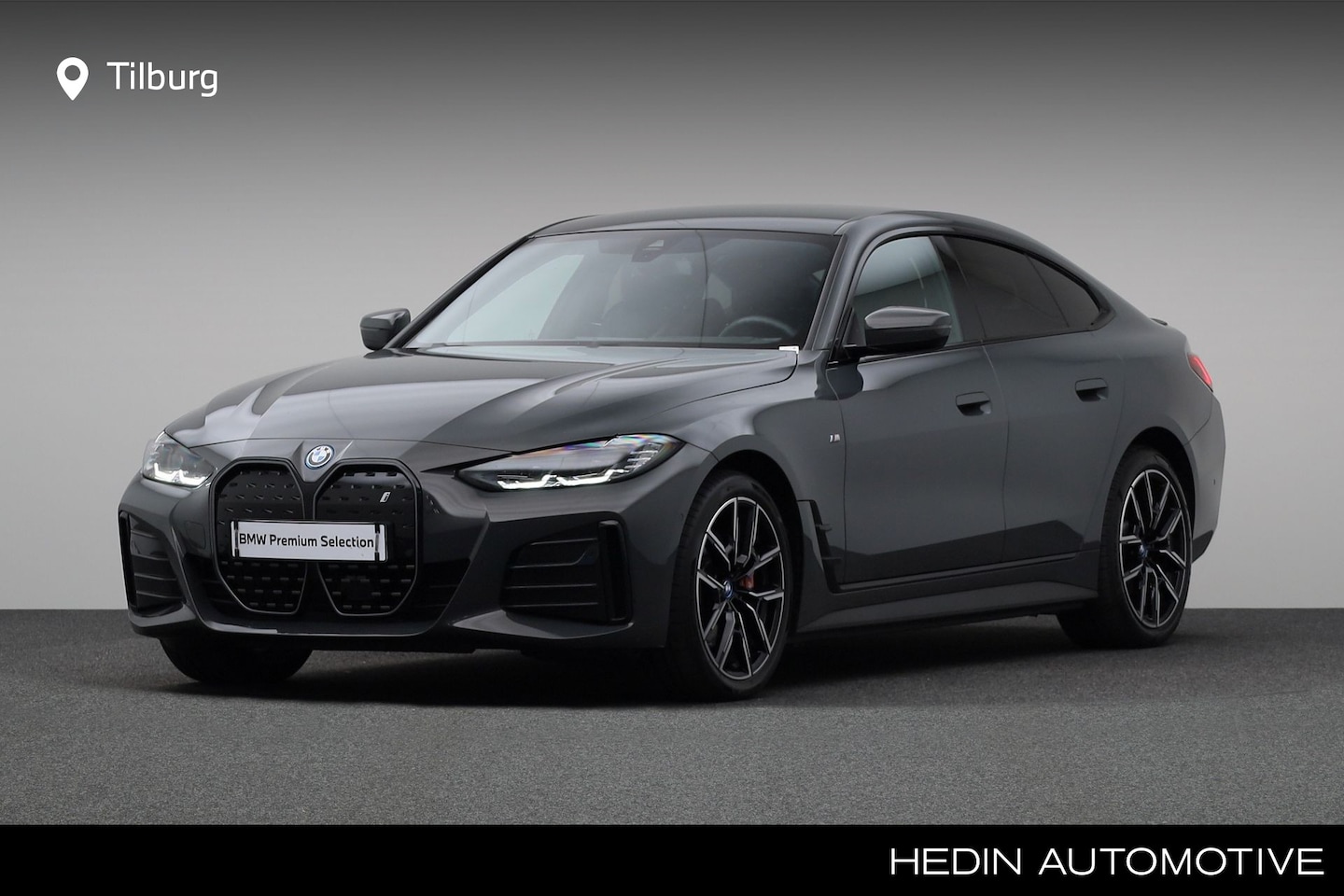BMW i4 - eDrive40 High Executive 84 kWh | Achteruitrijcamera | Harman Kardon | M Sportpakket Pro | - AutoWereld.nl