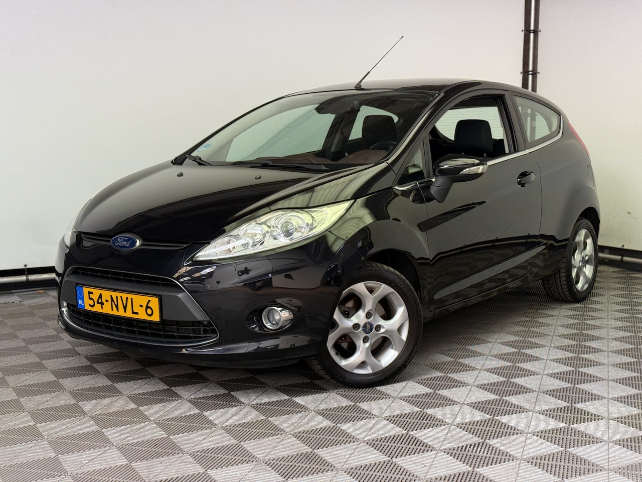 Ford Fiesta - 1.25 Titanium 3-drs ECC Cruise LM16" NL Auto - AutoWereld.nl