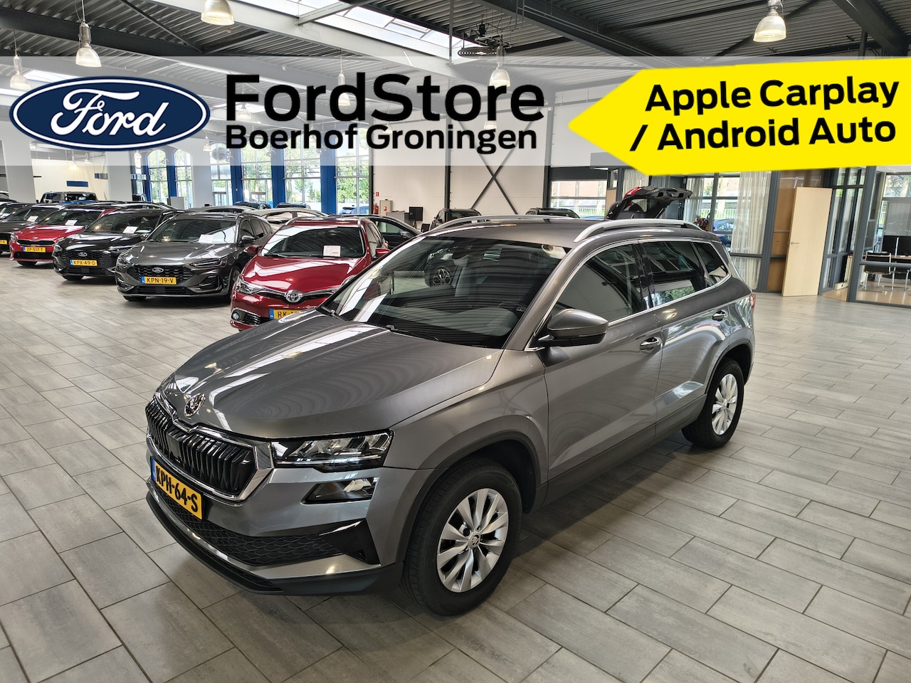 Skoda Karoq - 1.5 TSI ACT 15pk Business Edition | Cruise Control | Climate Control | Camera | Apple Carp - AutoWereld.nl