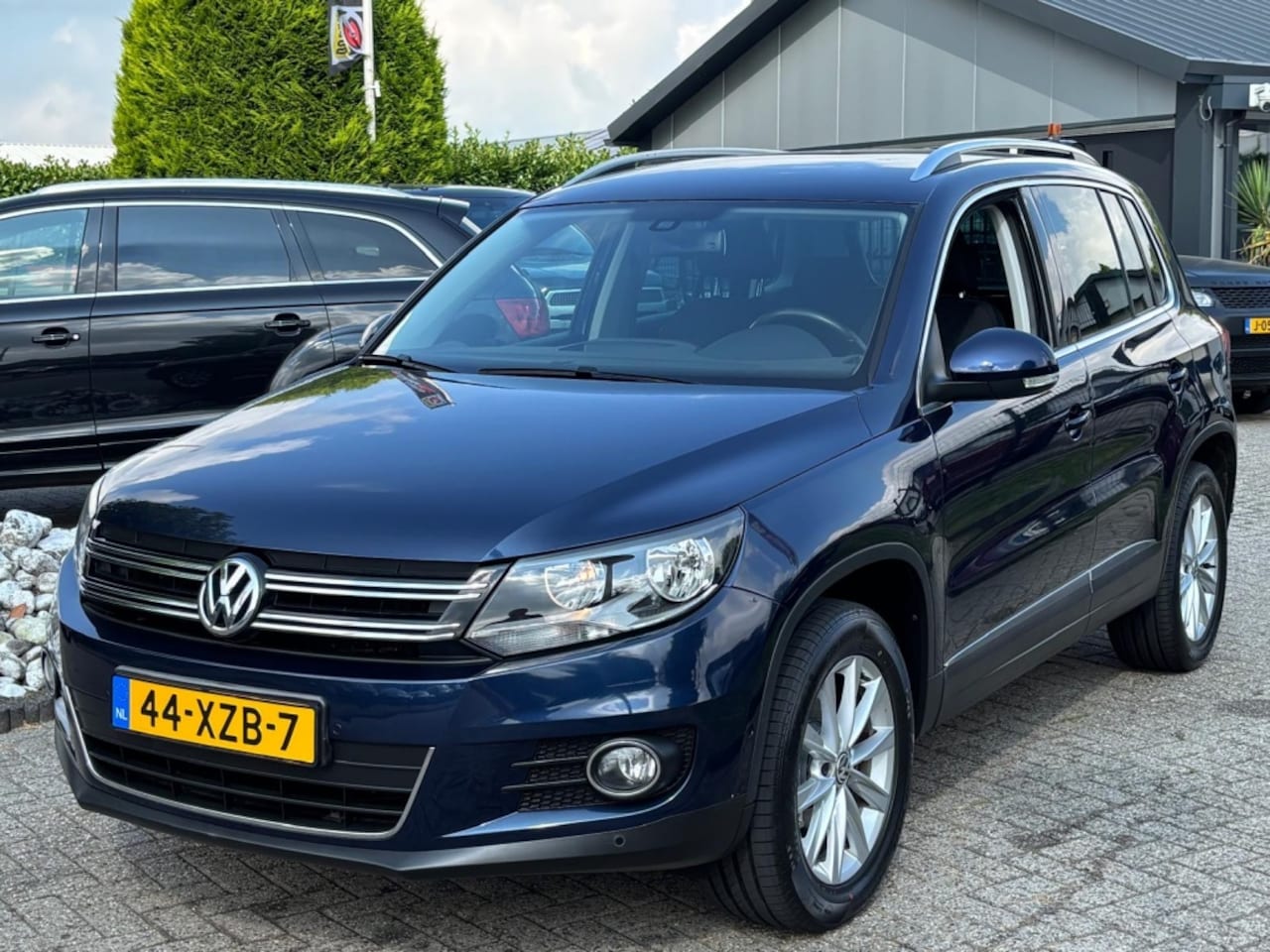 Volkswagen Tiguan - 2.0 TSI 4Motion Automaat 2012 Dealerauto 1E Eigenaar - AutoWereld.nl