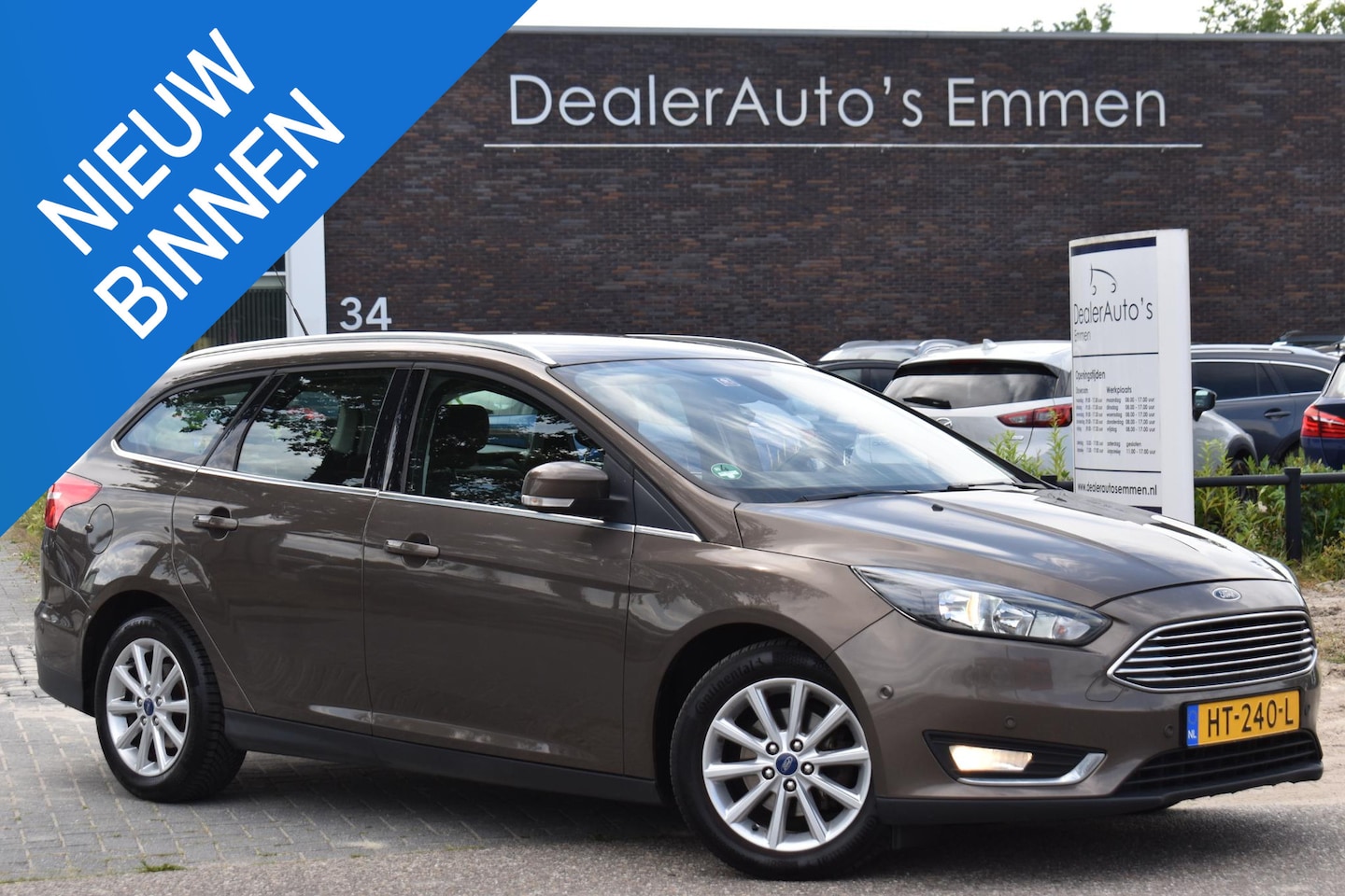 Ford Focus Wagon - 1.0 125pk ECC NAVI LMV CRUISE TREKHAAK - AutoWereld.nl