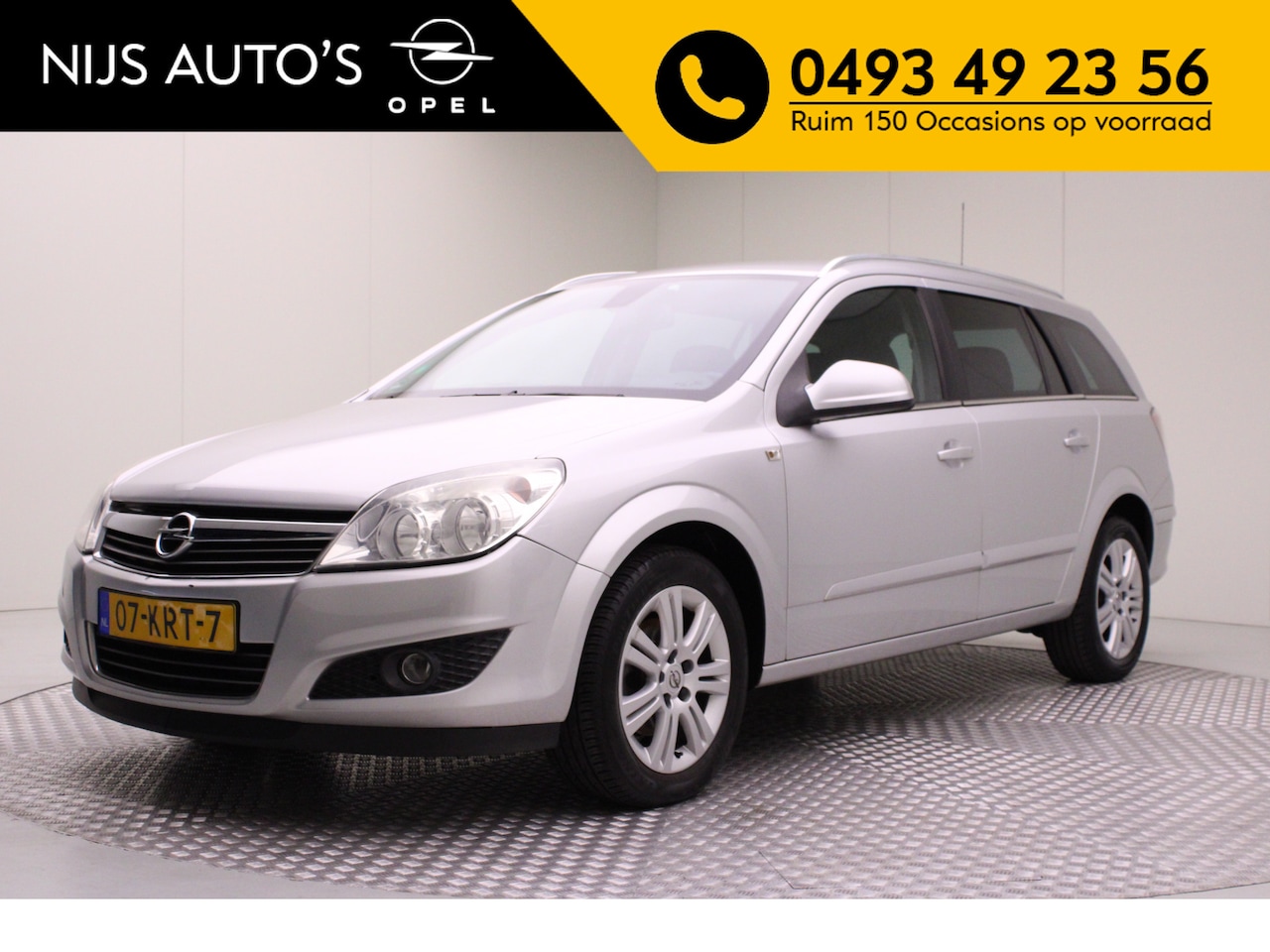 Opel Astra Wagon - 1.6 Cosmo | lederen bekleding | bluetooth | climate control | navigatie | stoel verwarming - AutoWereld.nl