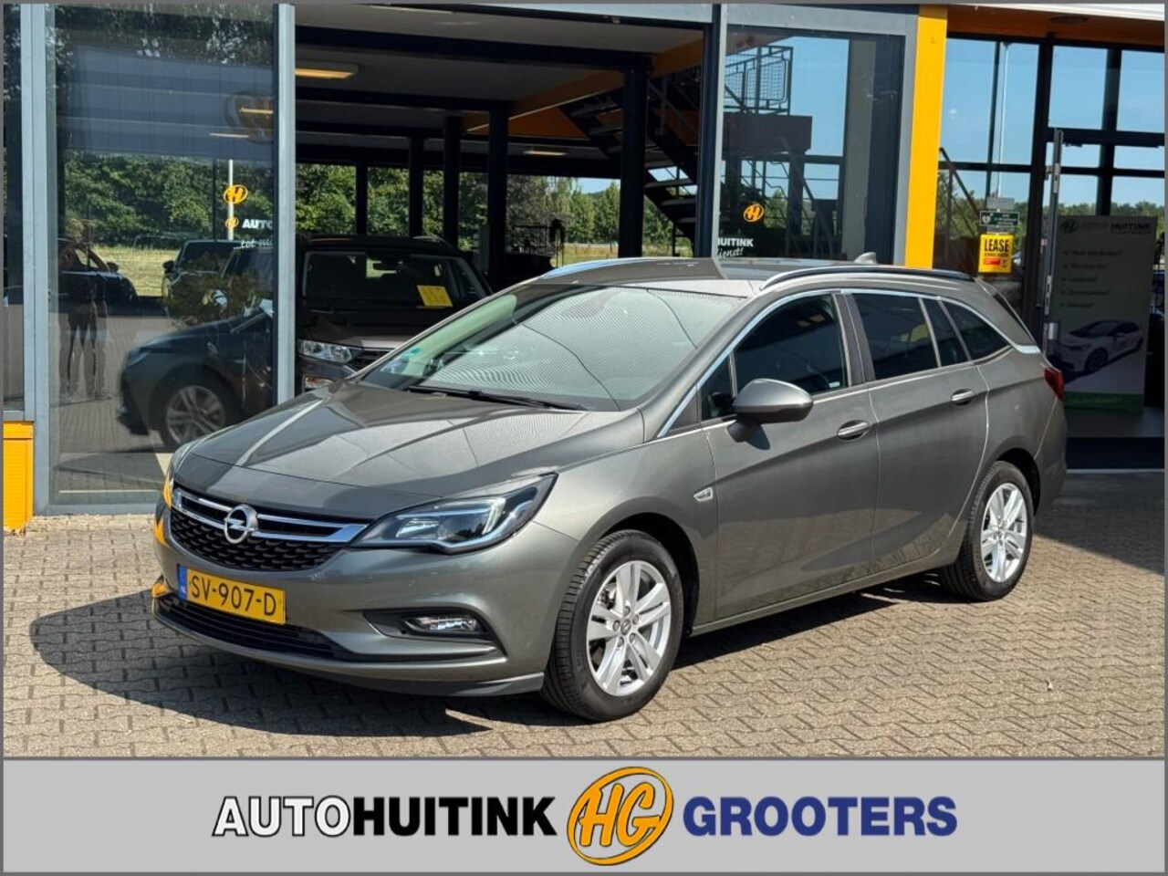 Opel Astra - 1.4 Online Edition - trekhaak - sensoren - climate control - navi - apple/android - AutoWereld.nl