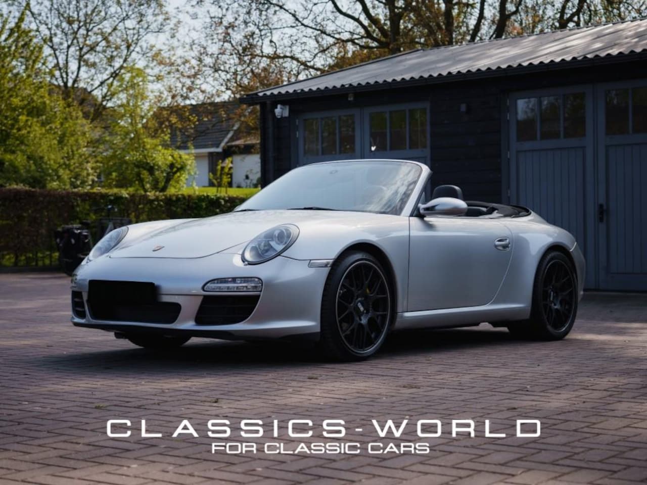 Porsche 911 Cabrio - Carrera 3.6L Cabrio - Artic Silver Metallic - 6 speed Manual - AutoWereld.nl