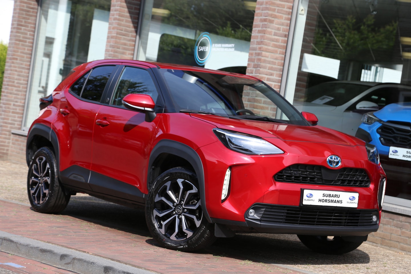 Toyota Yaris Cross - 1.5 Hybrid AWD-I Dynamic Team Navi Camera LED ACC - AutoWereld.nl