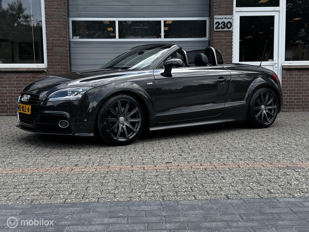 Audi TT Roadster - 1.8 TFSI LEDER/NAVI/CRUISE/AIRCO - AutoWereld.nl