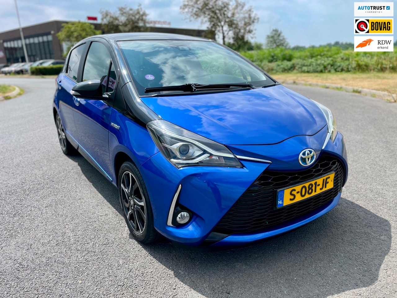 Toyota Yaris - 1.5 Hybrid Premium 1.5 Hybrid Premium, Bi-Tone, Aut, Trekhaak, Navi, Cam, Cruise/Climate control, Keyless, Lm - AutoWereld.nl