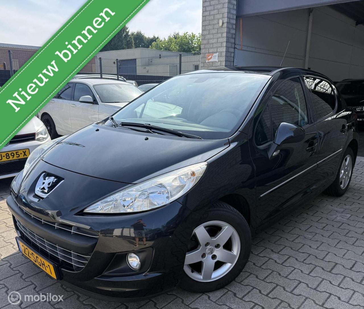 Peugeot 207 - 1.4 VTi Allure / BJ 2011 / Airco / N.A.P - AutoWereld.nl