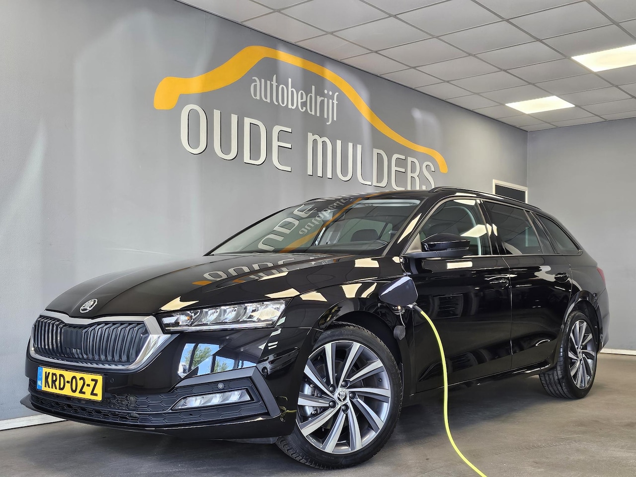 Skoda Octavia Combi - 1.4 TSI iV PHEV Business Edition | Stoelverwarming | Carplay | Led | Navi | - AutoWereld.nl