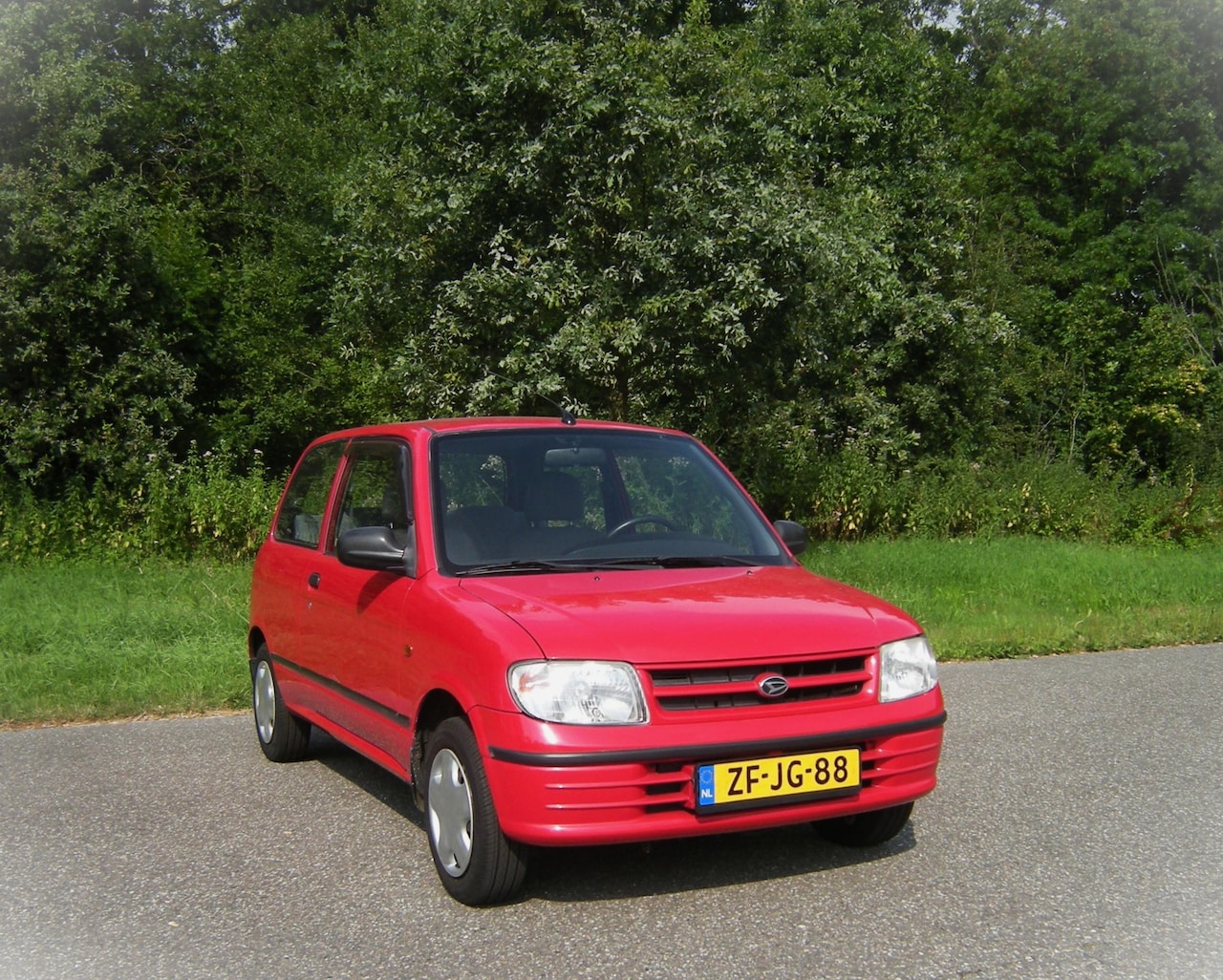 Daihatsu Cuore - 1.0-12V RTi . 3 Drs . AUTOMAAT . PDC achterzijde . Elec ramen en spiegels . Centrale deurv - AutoWereld.nl