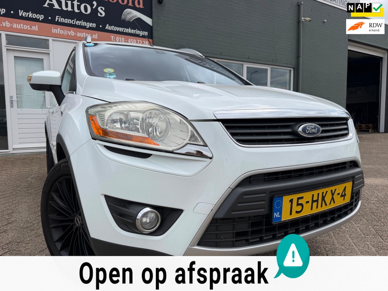 Ford Kuga - 2.5 AWD en 200 Pk en trekhaak en parkeersensoren en bluetooth telefoon en airco - AutoWereld.nl